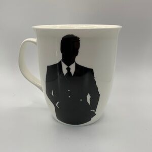 Man in tuxedo mug black and white